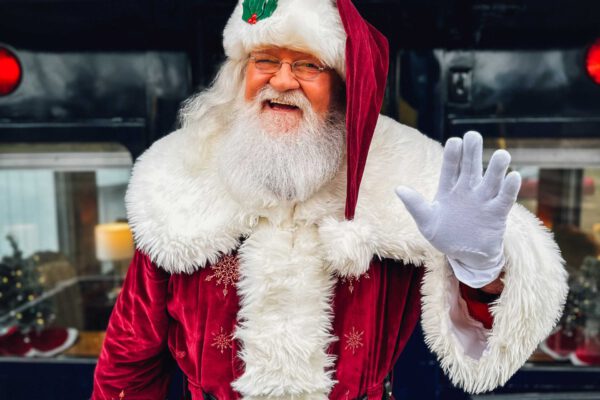 Santa Waves Hello from Christmas Train