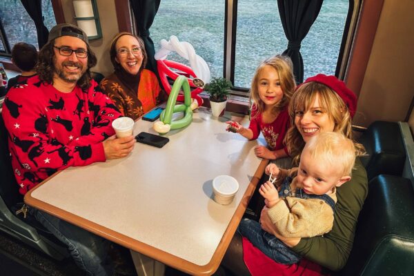 Smiling First Class Passengers aboard Indiana Christmas Train
